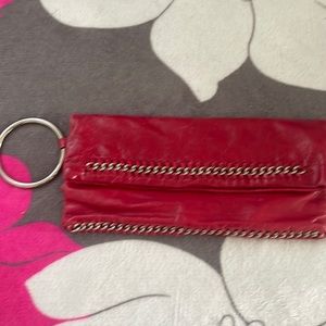 NWOT bebe large red clutch